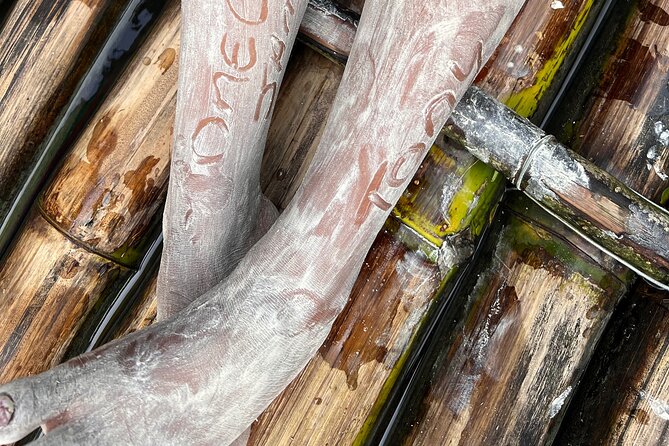 Bamboo rafting with limestone massage - Champagne, Coconut, Fruit, and Music: The Pre-Raft Vibe