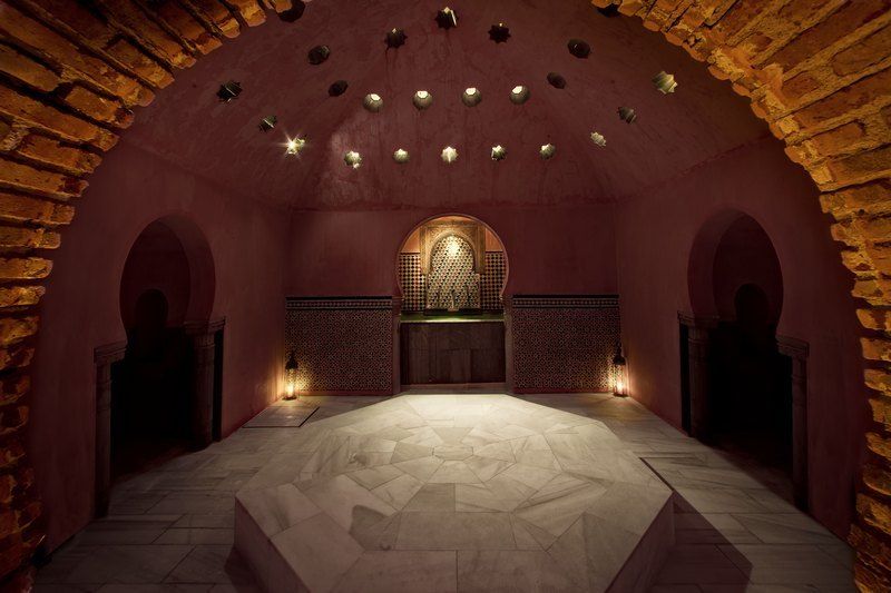 Granada: Alhambra Guided Tour and Arabian Bath and Massage - Alhambra Morning: Official Guide Time in Nasrid Palaces and Fortress Areas
